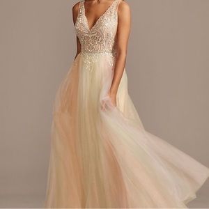 Bust 46.5 inches, waist 39 inches. Multicolored tulle prom dress never worn